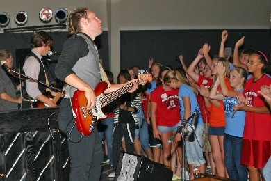 Mark Laidman on bass guitar with district youth